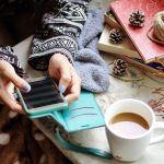 woman reading on a smartphone